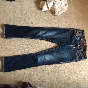 Size 27 curvy boot cut mid rise Rock Revival jeans